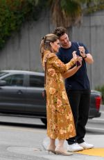 MARIA SHRIVER Photographs Patrick Schwarzenegger Under a Billboard for Their MOSH Products 09/21/2023
