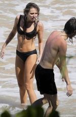 MILEY CYRUS in Bikini at a Beach in Hawaii 09/06/2023