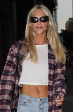 POPPY DELEVINGNE in Ripped Denim Out in New York 09/09/2023