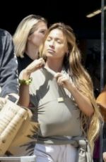 TIA BLANCO and Brody Jenner Shopping at Erewhon in Los Angeles 09/01/2023