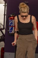 AMBER HEARD Hobbling on Crutches Out in Madrid 10/13/2023