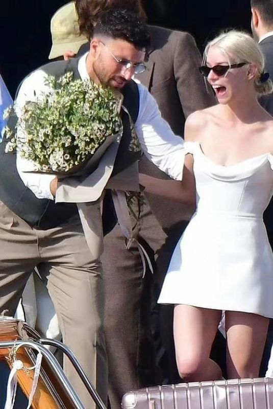 ANYA TAYLOR-JOY Boarding a Venetian Water Taxi at Her Wedding in Venice 10/05/2023