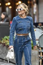 ASHLEY ROBERTS Leaves Global Studios Heart Breakfast Show in London 10/16/2023