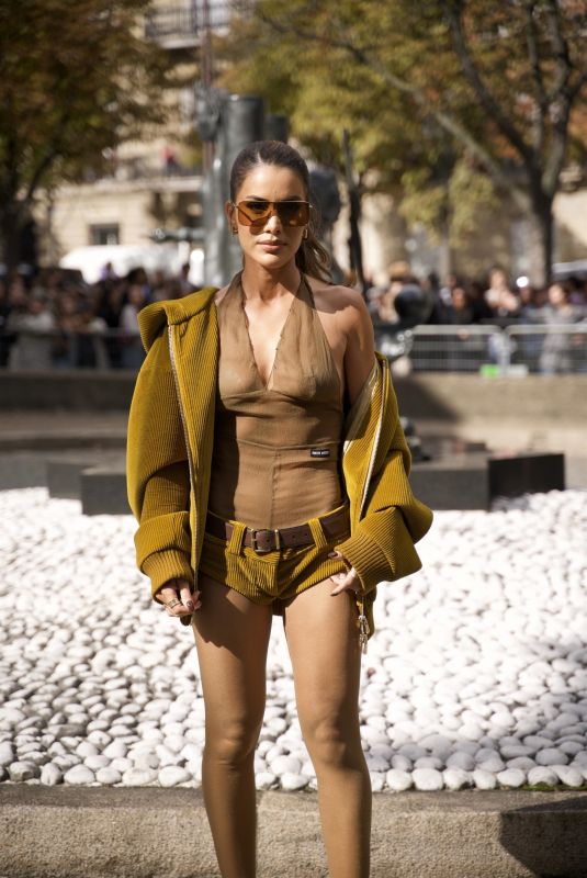 CAMILA COELHO Arrives at Miu Miu Womenswear Spring/Summer 2024 Show at Paris Fashion Week 10/03/2023