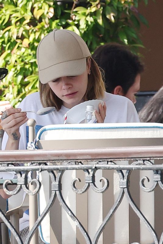 CARA DELEVINGNE Out for Breakfast with Friends at Belmond Hotel Cipriani in Venice 09/30/2023