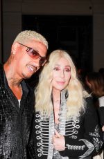 CHER and Alexander Edwards Leaves Hotel Costes in Paris 10/02/2023
