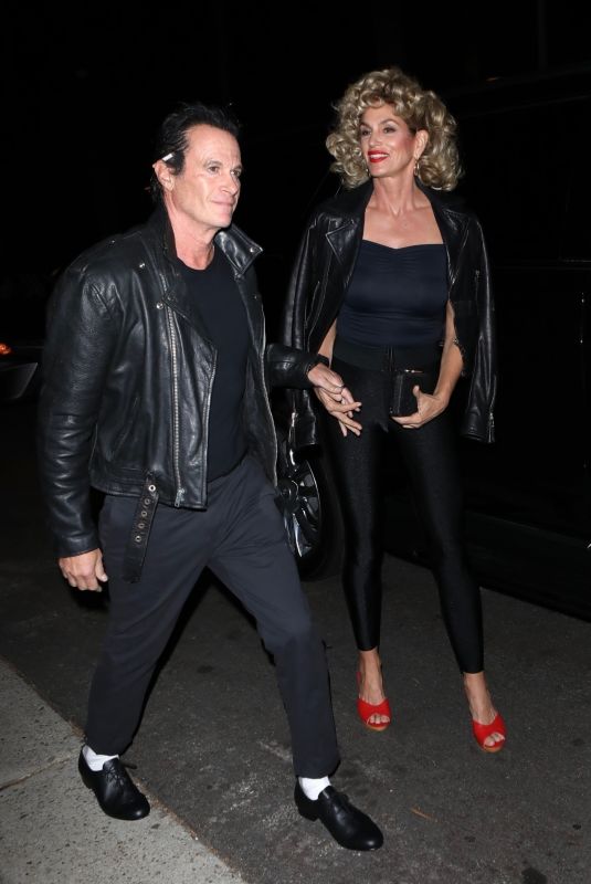 CINDY CRAWFORD and Rande Gerber Arrives at Casamigos Halloween Party in Los Angeles 10/27/2023