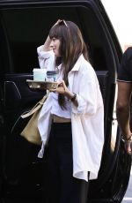 DAKOTA JOHNSON Celebrating Her Goddaughter