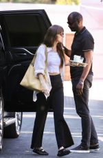 DAKOTA JOHNSON Celebrating Her Goddaughter
