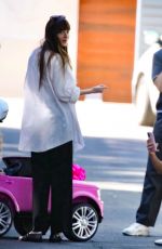 DAKOTA JOHNSON Celebrating Her Goddaughter