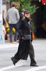 ELIZABETH OLSEN and Robbie Arnett Out in New York 10/19/2023