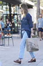 ELIZABETH OLSEN Out Shopping at Erewhon Market in Los Angeles 10/16/2023