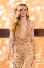 ELLE FANNING at Le Defile L