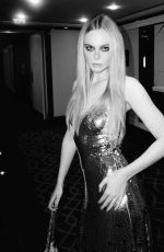 ELLE FANNING - Rabanne x H&M Event Photoshoot, October 2023