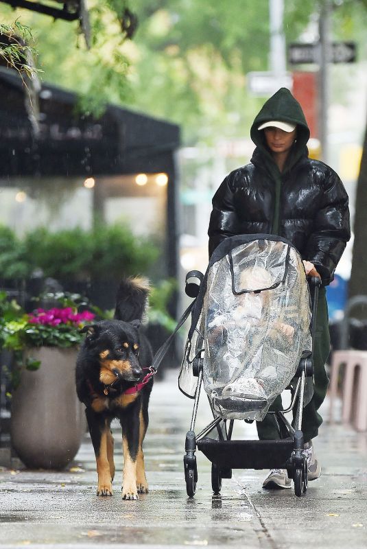 EMILY RATAJKOWSKI Out with Her Baby and Dog on a Rainy Day in New York 10/14/2023