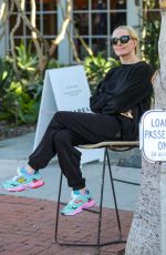 ERIKA JAYNE Waiting for Her Car at Valet on Melrose Place 10/12/2023