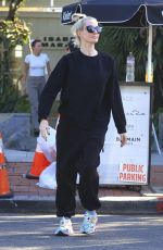 ERIKA JAYNE Waiting for Her Car at Valet on Melrose Place 10/12/2023