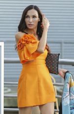 FAMKE JANSSEN in a Yellow Mini Dress Out with a Friend in New York 10/04/2023