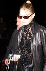 GIGI HADID Arrives at Miu Miu After-party in Paris 10/03/2023