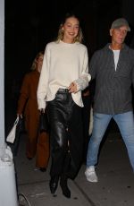 GIGI HADID Leaves Opening of Her Store Guest in Residence in New York 10/19/2023