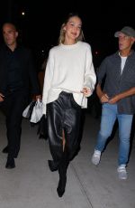 GIGI HADID Leaves Opening of Her Store Guest in Residence in New York 10/19/2023