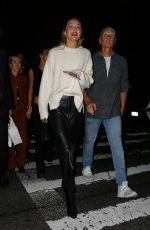 GIGI HADID Leaves Opening of Her Store Guest in Residence in New York 10/19/2023