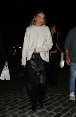 GIGI HADID Leaves Opening of Her Store Guest in Residence in New York 10/19/2023