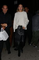 GIGI HADID Leaves Opening of Her Store Guest in Residence in New York 10/19/2023