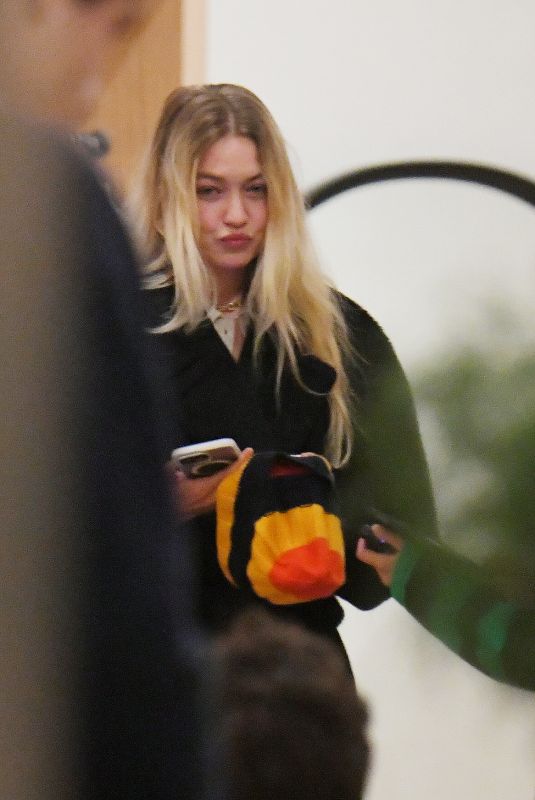 GIGI HADID Meets up with Friends at Her Guest in Residence Store in New York 10/16/2023