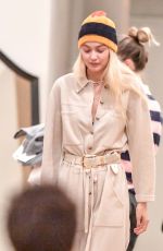 GIGI HADID Meets up with Friends at Her Guest in Residence Store in New York 10/16/2023