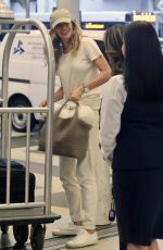 GISELE BUNDCHEN Arrives at Miami International Airport 10/25/2023