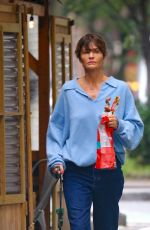 HELENA CHRISTENSEN Out with her Dog in West Village 09/30/2023