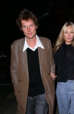 KATE MOSS in a Short Black Blazer, Shear Top, Jeans and Boots Out in London 09/29/2023