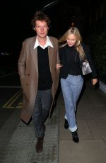 KATE MOSS in a Short Black Blazer, Shear Top, Jeans and Boots Out in London 09/29/2023