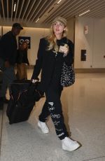 KATHRYN NEWTON Arrives at LAX Airport in Los Angeles 10/15/2023