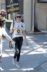 KATIE CASSIDY at SAG Strike at Warner Brothers Studios in Burbank 10/16/2023