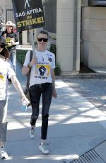 KATIE CASSIDY at SAG Strike at Warner Brothers Studios in Burbank 10/16/2023