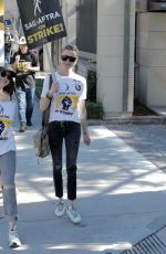 KATIE CASSIDY at SAG Strike at Warner Brothers Studios in Burbank 10/16/2023