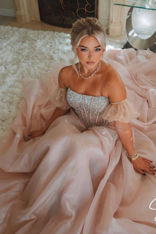 KATIE SIGMOND at a Photoshoot, October 2023