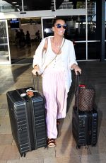 KYLY CLARKE Arrives at Sydney International Airport 10/30/2023