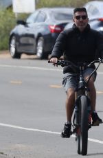 LAUREN SILVERMAN and Simon Cowell at a Bike Ride in Malibu 10/04/2023