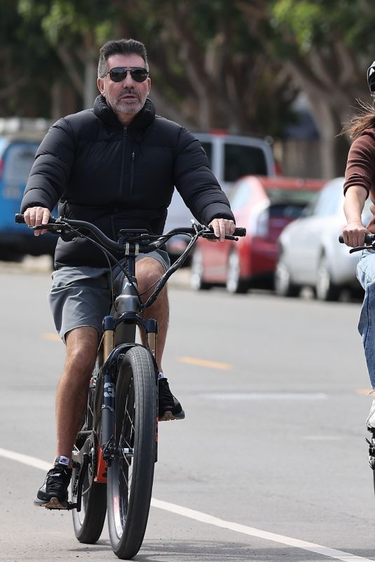 LAUREN SILVERMAN and Simon Cowell at a Bike Ride in Malibu 10/04/2023
