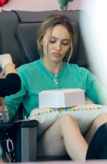 LILY-ROSE DEPP in a Black Miniskirt Out in Los Angeles 10/12/2023