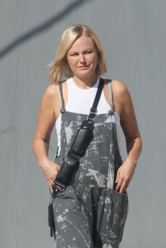 MALIN AKERMAN in Gray Overalls and White Sneakers Out in Los Angeles 10/27/2023