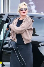 MELANIE GRIFFITH Shopping at Maxfield in West Hollywood 10/01/2023