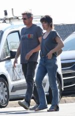 MILLA JOVOVICH and Paul W.S. Anderson Inspecting a Under-construction Home in Brentwood 10/10/2023