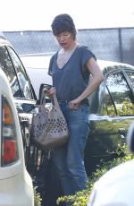 MILLA JOVOVICH and Paul W.S. Anderson Inspecting a Under-construction Home in Brentwood 10/10/2023