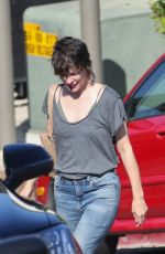 MILLA JOVOVICH and Paul W.S. Anderson Inspecting a Under-construction Home in Brentwood 10/10/2023