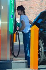 MILLA JOVOVICH at Gas Station in Los Angeles 10/03/2023