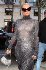 PARIS and NICKY HILTON Leaves Balenciaga Show in Paris 10/01/2023